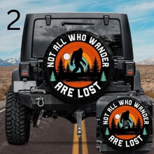 Load image into Gallery viewer, not all who wander are lost bigfoot jeep tire cover
