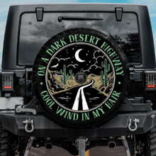 Load image into Gallery viewer, On a Dark Desert Highway Spare Tire Cover
