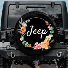 Load image into Gallery viewer, vintage jeep tire cover with flower wreath, spare tire cover with jeep
